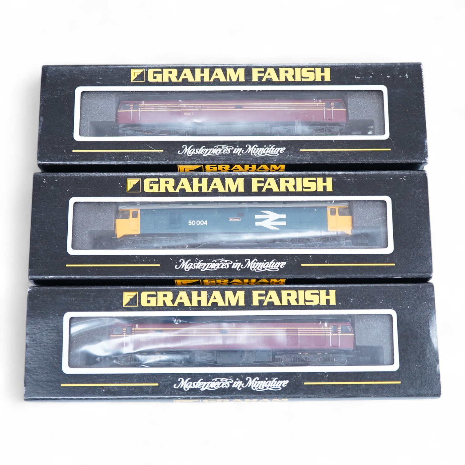 Three boxed Graham Farish N gauge railway class 50 diesel locomotives; a BR, 50 004 (371251), and two LMS, 50017, (371250)